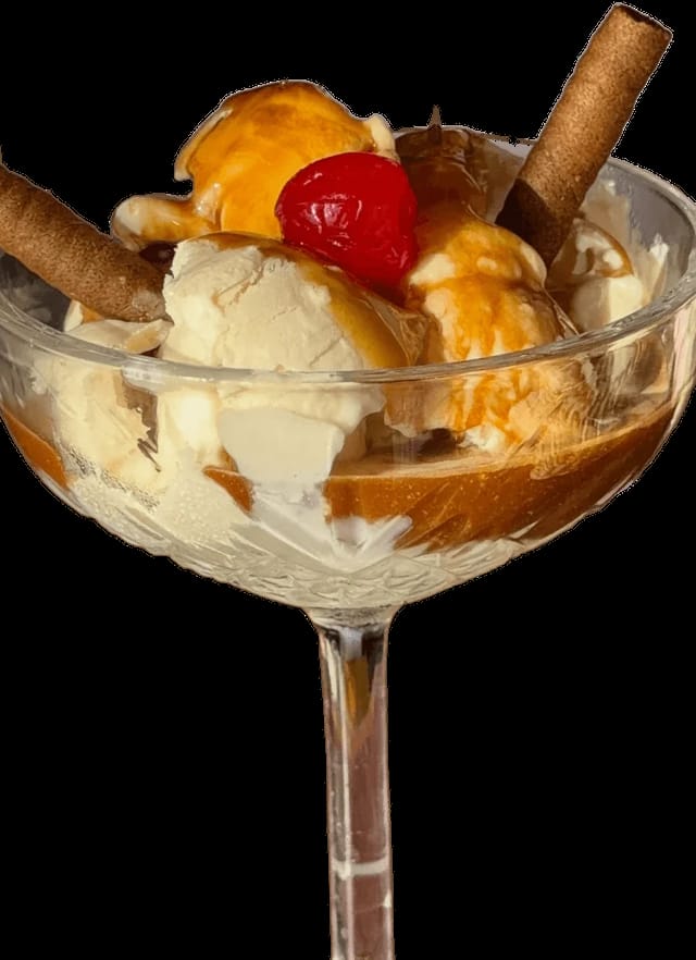 Affogato with ice cream, coffee and wafer rolls