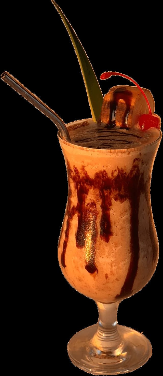 Frozen drink with chocolate, cherry and a straw